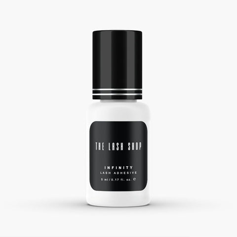 bottle of infinity lash adhesive