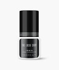 bottle of ionik lash adhesive
